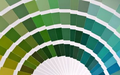 Fanned out green paint swatches
